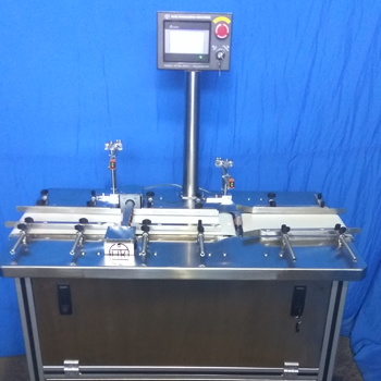 CARTON REVERSING & TURNING MACHINE